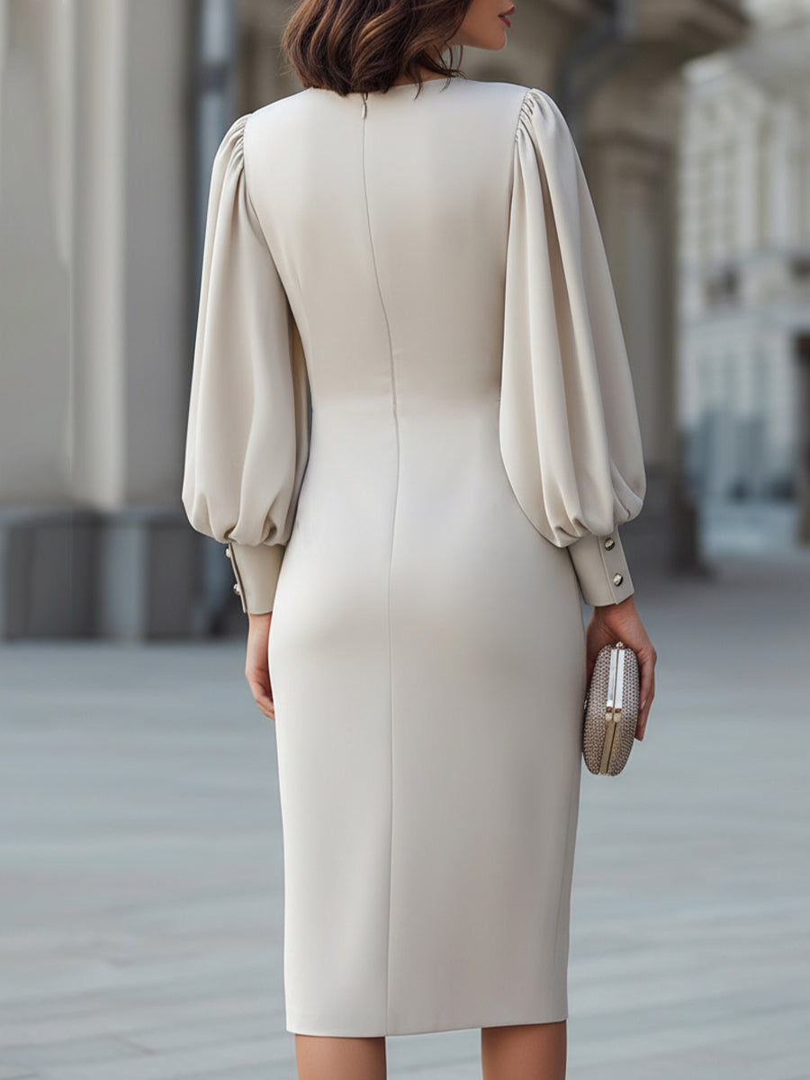Rochie midi cu talie drapată și mâneci bufante