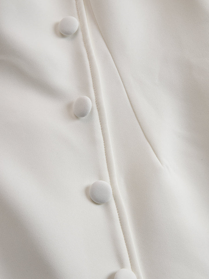 Rochie asimetrică elegantă cu nasturi