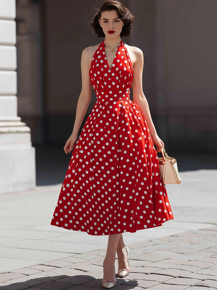 Rochie midi cu buline, decolteu tip halter și croială în formă de A