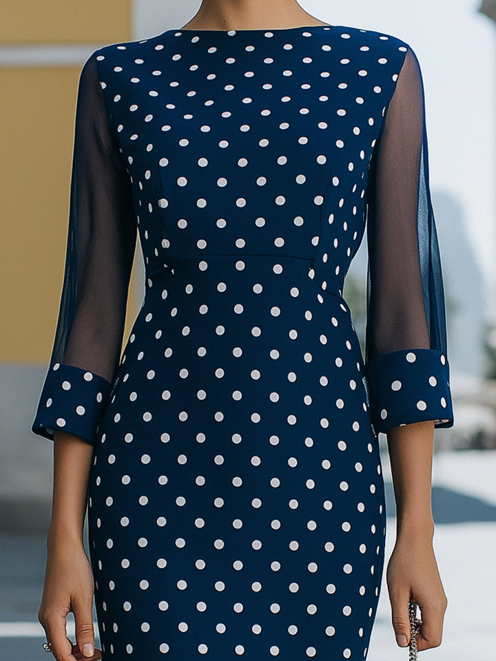 Rochie elegantă bleumarin midi cu buline albe și mâneci din plasă