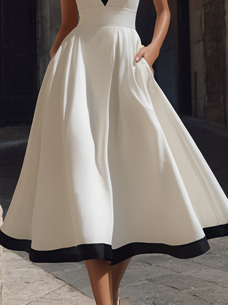 Rochie midi elegantă în formă de A, cu decolteu în V, tiv contrastant și buzunare