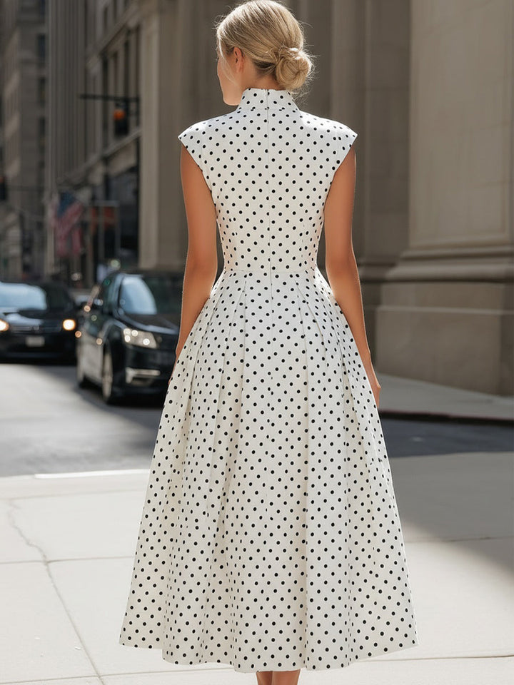 Rochie midi vintage cu buline, guler înalt și mâneci tip bretele