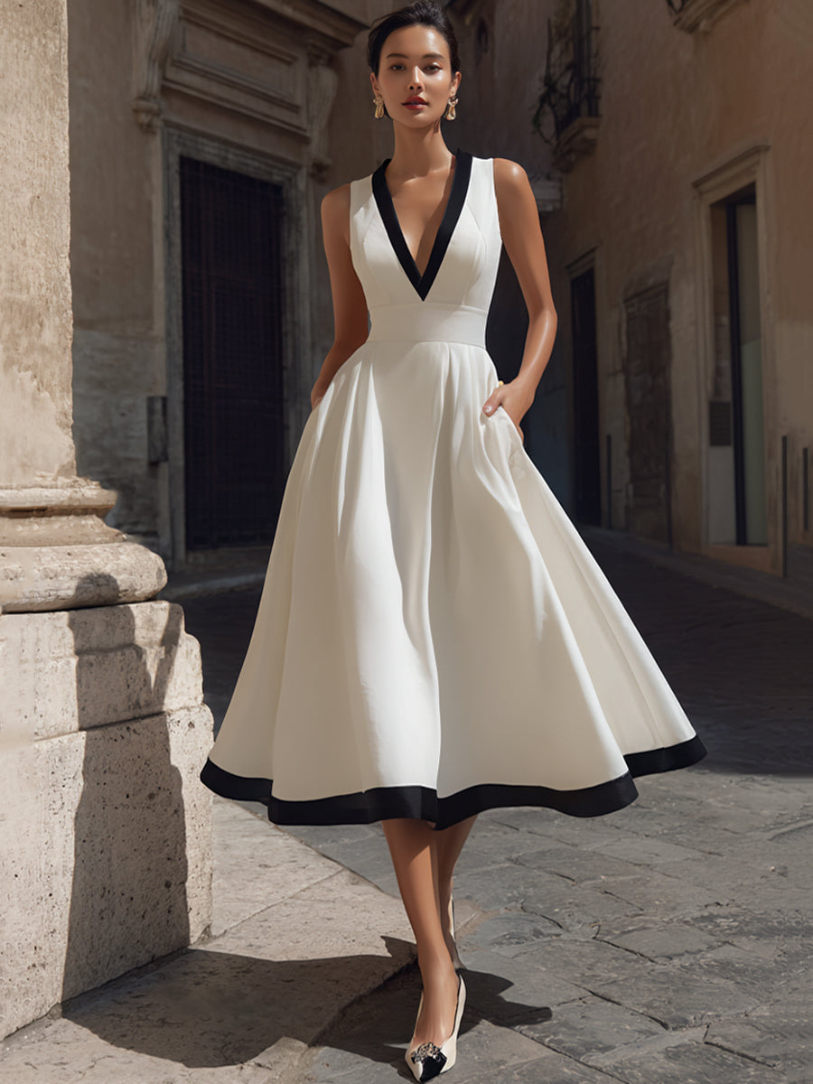 Rochie midi elegantă în formă de A, cu decolteu în V, tiv contrastant și buzunare