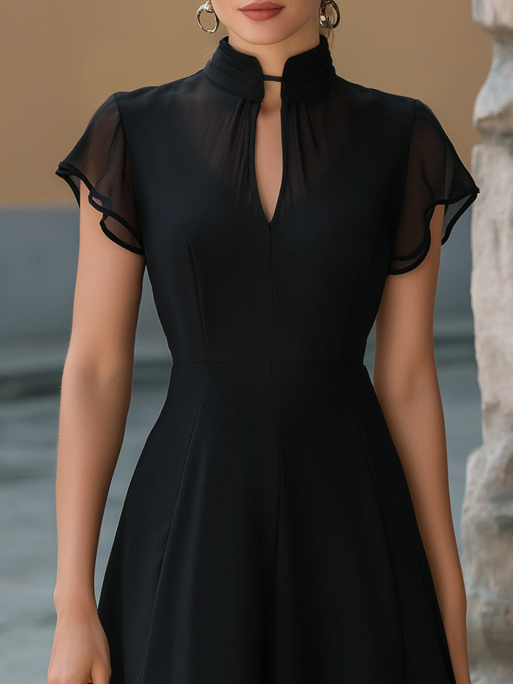 Rochie A-line cu guler mandarin din șifon și volane